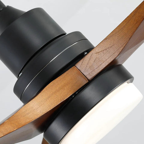 Close-up of 52 Inch Solid Wood Ceiling Fan With Remote And Dimmable Light focusing on walnut wood blades and light fixture.