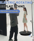 Foxvee Heavy Duty Motorized Turntable 23.6 Inch Remote Control Rotating Display Stand For 3D Scanning And Photography 360 Degree Speed Adjustable Platform in use during a photoshoot.