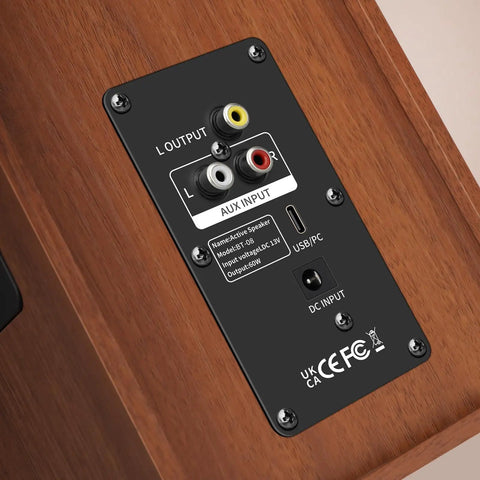 Close-up of RCA input on Powered Bluetooth 5.3 Bookshelf Speakers With 60W Peak Output, Wooden Monitor Speakers