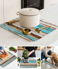 Go To Absorbent Dish Drying Mat 16 By 18 Inches in Vintage Wood Grain with kitchen utensils and pot on countertop