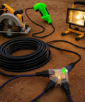 Heavy Duty 200 Ft Outdoor Extension Cord With 14 Gauge 3-Conductor SJTW, Lighted End And Triple Outlet, coiled on ground