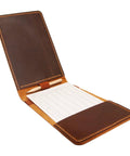 Open Personalized Leather Golf Yardage Book Holder and Scorecard Cover for Golfers, showing pencil and scorecard inside.