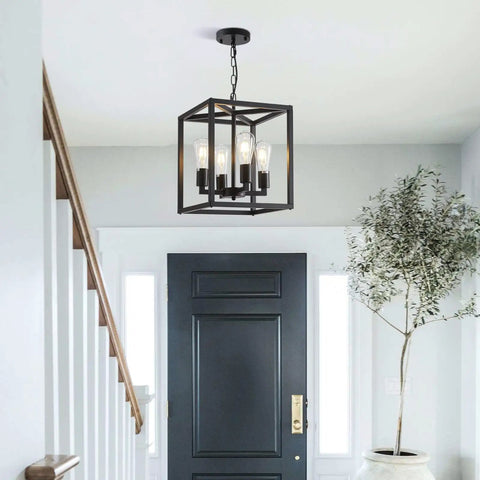 Rustic Industrial 4 Light Farmhouse Chandelier Pendant Lighting with adjustable height metal cage in a bright foyer.