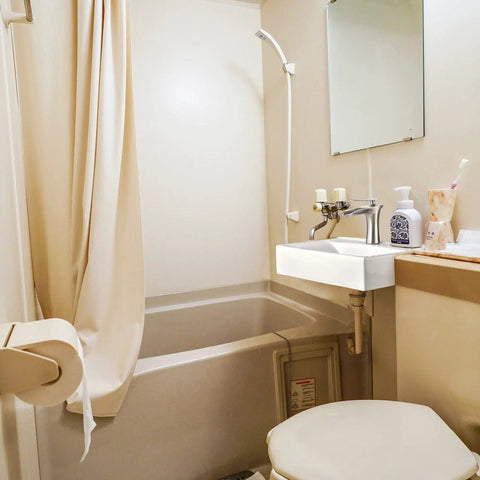 Small bathroom with Porcelain Bathroom Vessel Sink 18 By 12 Inch Rectangle With Pop Up Drain, wall-mounted beside bathtub.
