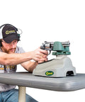 Person using Steady Rest NXT Adjustable Ambidextrous Rifle Rest for range shooting on table