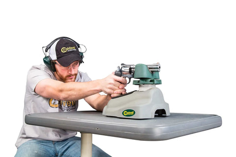 Person using Steady Rest NXT Adjustable Ambidextrous Rifle Rest for range shooting on table