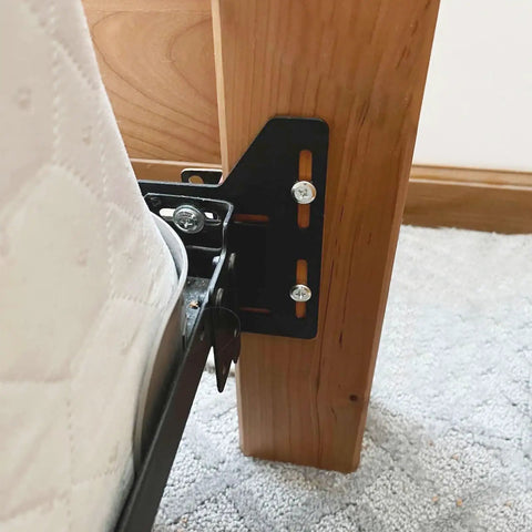 Full To Queen Conversion Kit Pair Of Adjustable Headboard Brackets For Metal Bed Frames Quick Install No Sweat Setup Slides Four Inches For Super Room Upgrade showing installed bracket on bed leg.