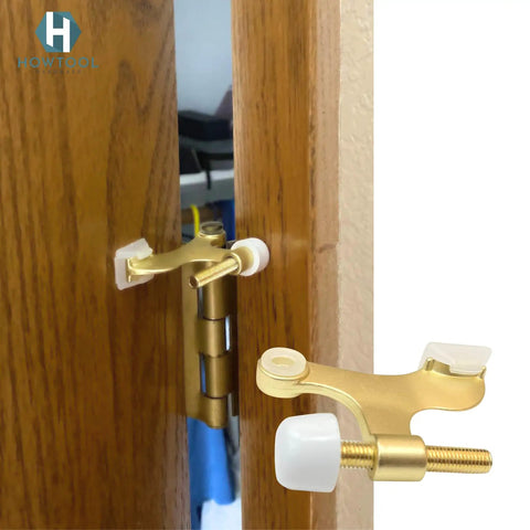 Solid Five Pack Of Heavy Duty Hinge Pin Door Stoppers In Premium Satin Brass Matte Gold Finish installed on a door.