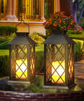 Outdoor Solar Lanterns 14 Inch Hanging LED Lights, 2 Pack, Waterproof, Flickering Flame Look on patio table