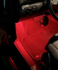 Kickin Red LED Glove Box And Footwell Lights illuminating Volkswagen interior with bright red glow