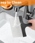 Heavy Duty Stainless Steel Grill Scraper 3 In 1 Griddle Scraper being cleaned under tap water