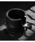 58mm Adjustable Portafilter Holder And Espresso Tamping Station in black with heavy duty silicone mat for secure grip.