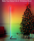 65 Inch Color Changing LED Floor Lamp With Music Sync Remote And App Control Dope Vibe RGB Mood Lighting beside Christmas tree
