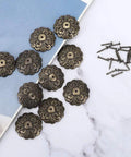 30 Piece Retro Zinc Alloy Upholstery Tacks And Furniture Nails 22mm Round Heads With 10mm Shank For Sofa Chair Bed DIY Makeovers To Snag Quick Fixes And Level Up Your Home Digs Today on a blue background.