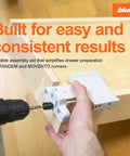 Precision drilling template for concealed undermount drawer runners that simplifies installation, showing drilling process.