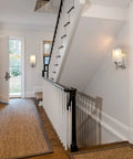 Two Pack Modern Sconces Wall Lighting Brushed Nickel Vanity Fixtures With Frosted Glass Shades illuminating hallway