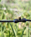 Misting System For Outdoor Patio And Garden With 20 Brass Nozzles, 59 Ft Tubing, Three Quarters Inch Brass Adapter, spraying water
