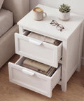 Open white dresser drawers with No Drill Self Adhesive Finger Pulls for Cabinets, 20 Pack, 3.15 Inch White, cup and plant on top.