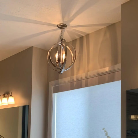 Open Globe Chandelier 21 Inch 4-Light Modern Sphere Orb Pendant in Brushed Nickel Finish hanging in a room