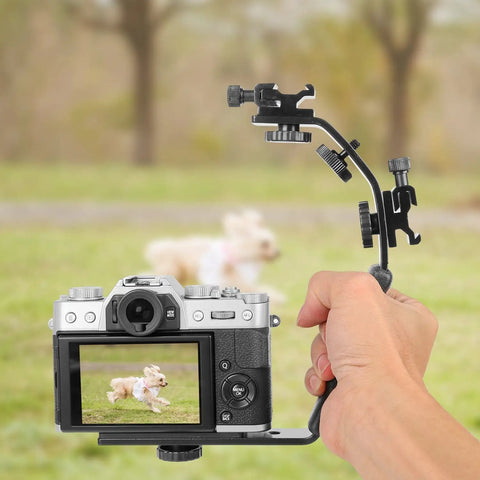 Heavy Duty DSLR L Bracket Mount With Dual Cold Shoe Mounts And Quarter Inch Tripod Thread Padded Hand Grip Video Grip For Cameras And Camcorders Stabilizes Shots And Lets You Mount Lighting On The Go attached to camera capturing dog running.