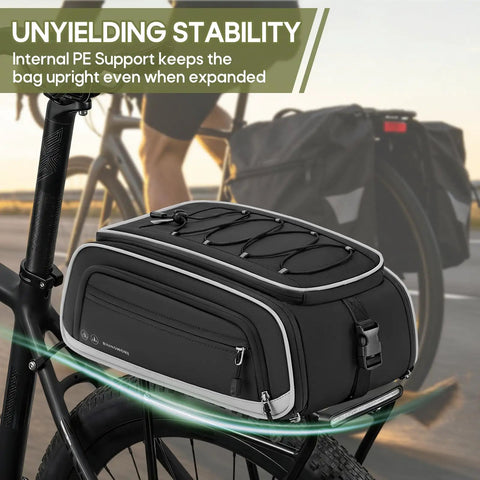 Expandable Waterproof Bike Trunk Bag 15L To 23L for rear rack attached on bike, showing design and stability features, outdoor setting