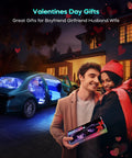 Couple holding App Controlled Car LED Interior Lights with visible glow inside car, gift for any occasion