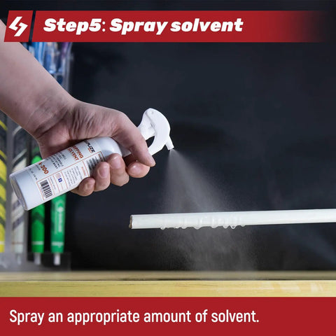 Applying 5oz solvent from All In One Golf Grip Regripping Kit With 5oz Solvent, 15 Grip Tapes, Tape Remover Tool, Hook Blade And Rubber Vise Clamp to club shaft