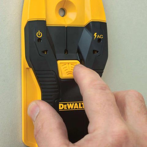 Hand using Stud Finder For Framing And DIY Projects Locates Three Quarter Inch Wood And Metal Studs With Center Find And LED Arrows