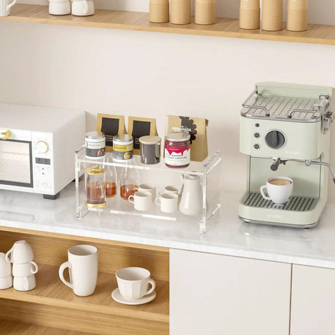 2 Tier Coffee Station Organizer for Countertops Acrylic Storage Shelf to Hold Mugs Beans Syrup Cups and Stirrers Neatly Stacked Barista Style Coffee Bar Setup Maximizes Counter Space and Rids Clutter