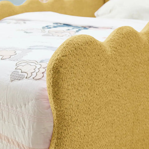 Close-up of the 3D Dino Headboard Kids Bed with safety guardrails, double size, terry cloth fabric upholstery for cozy sleep time.