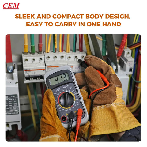 Person holding Versatile Digital Multimeter 600 Volt AC DC Voltage Meter With Backlit LCD Display in front of circuit board.