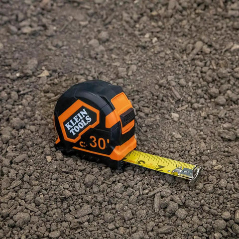 Heavy Duty Tape Measure With 30 Foot Double Hook, Double Sided Nylon Reinforced Blade, 13 Foot Standout on gravel surface
