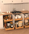 The Real Deal Heavy Duty Two Tier Pull Out Cabinet Organizer With Super Smooth Gliding Wood Shelves To Max Out Your Kitchen Pantry Space For Pots Pans Appliances And Groceries, showcasing wooden shelves with pantry items.
