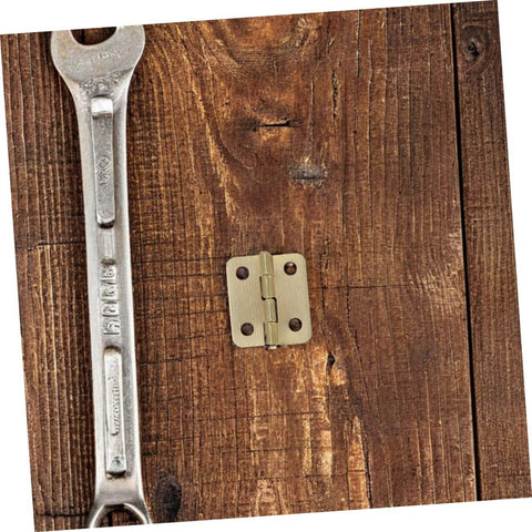 40 Pcs Miniature Brass Hinges With Screws For Jewelry Boxes And Dollhouses 270 Degree Tiny Hinge Hardware shown on wood