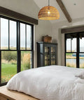 Boho Rattan Pendant Lamp With Hand Woven Wicker Rope Shade Dome Ceiling Basket Chandelier LED in cozy farmhouse bedroom
