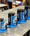 Heavy Duty Hydraulic Toe Jack Built Like A Tank For 30 Ton Heavy Lifting on a workshop table showing multiple angles.