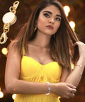Woman wearing stylish bracelet with round magnetic clasp from 18 Pcs Magnetic Necklace Clasp Set With 3 Styles In Gold And Silver.