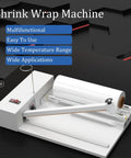 TYBJLXF 2-In-1 Shrink Wrap Heat Sealing Machine With Wrap Gun features a sleek design, white and silver color, ideal for commercial packaging.