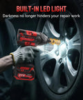User operating Straight Up Tough As Nails Cordless Impact Wrench 1/2 Inch Square Drive with LED light on a vehicle wheel.