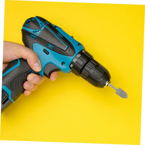 Hand holding drill with Pro Grade Polishing Buffing Wheel Bits Kit for rotary tools on a yellow background