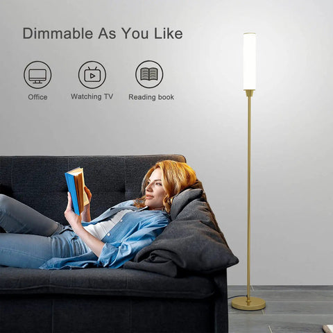 Gold Floor Lamp With Remote And Foot Switch, 360 Degree LED Light, Stepless Dimming From 3000K To 6000K next to a woman on a sofa