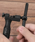 Universal Bike Chain Breaker Tool And Cutter For 7 8 9 10 11 Speed Chains With Spare Replaceable Pin in hand on wooden surface
