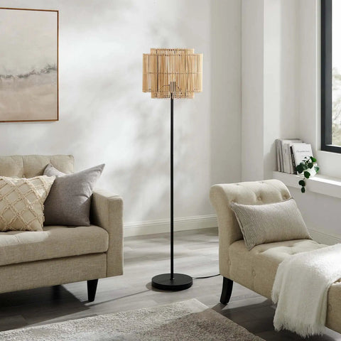 Nourish Bamboo Floor Lamp In Natural Finish With Basket Weave Two Tier Shade Modern Iron Base On Off Switch LED Compatible E26 60W Max Bulb Not Included Perfect Cozy Vibes For Living Room Or Bedroom next to beige sofa in living room