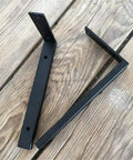 Heavy Duty Wall Mounted L Shape Shelf Brackets Two Pack Slick Black Finish Rust Proof Steel on wooden surface