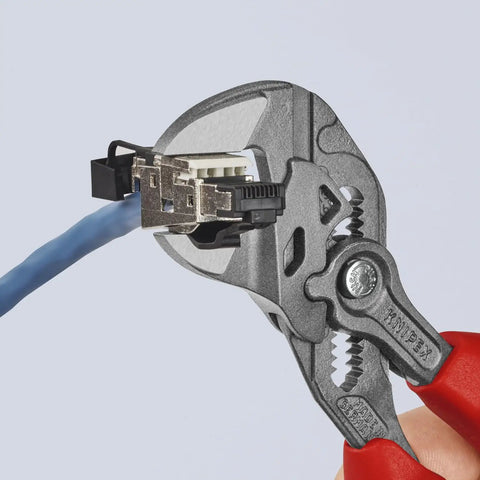 7.25 Inch Pliers Wrench With Smooth Jaws And Black Finish Pro Grade Grip Tool for Damage Free Chrome Fittings holding a cable and connector