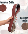 Heavy Duty Tough As Nails Sanding Belts For Belt Grinders 2x72 Inch 240 Grit Aluminum Oxide shown in hand, highlighting material.