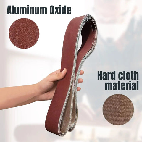 Heavy Duty Tough As Nails Sanding Belts For Belt Grinders 2x72 Inch 240 Grit Aluminum Oxide shown in hand, highlighting material.