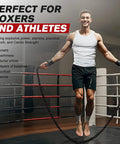 Man using Heavy Weighted Jump Rope For Full Body Workout 9.2ft Length 2.8lb Rope For Cardio Burn And Fitness Boxing Training Home Gym