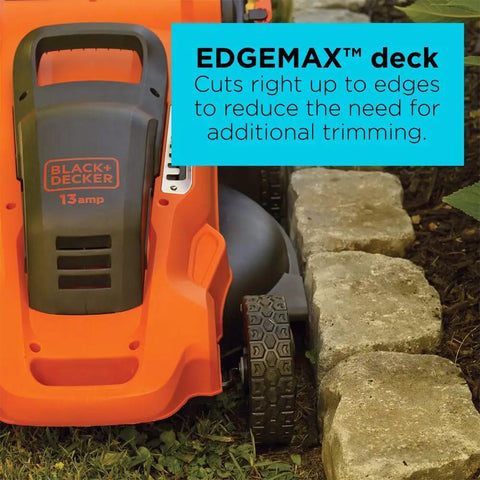 20 Inch Corded Electric Lawn Mower With 13 Amp Motor showing Edge Max deck for close edge cutting next to stone border