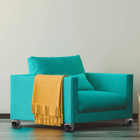 Top Shelf 2 Inch Antique Brass Swivel Casters With Heavy Duty Ball Bearings 4 Piece Furniture Wheel Set For Tables Chairs Cabinets And Rolling Storage Hardware on a turquoise armchair.